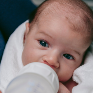 Baby bottle feeding image